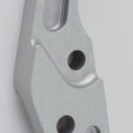 Caliper brckt clr Ohlins 11.8" l/h 00-up,